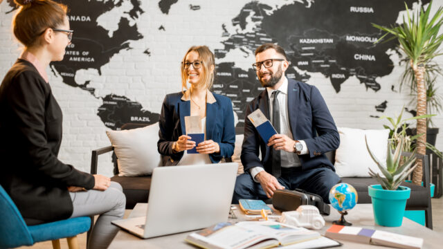 Businesscouple at the travel agency office